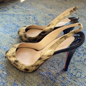 Beautiful Christian Louboutin sling back heels in gold/brown leopard print.